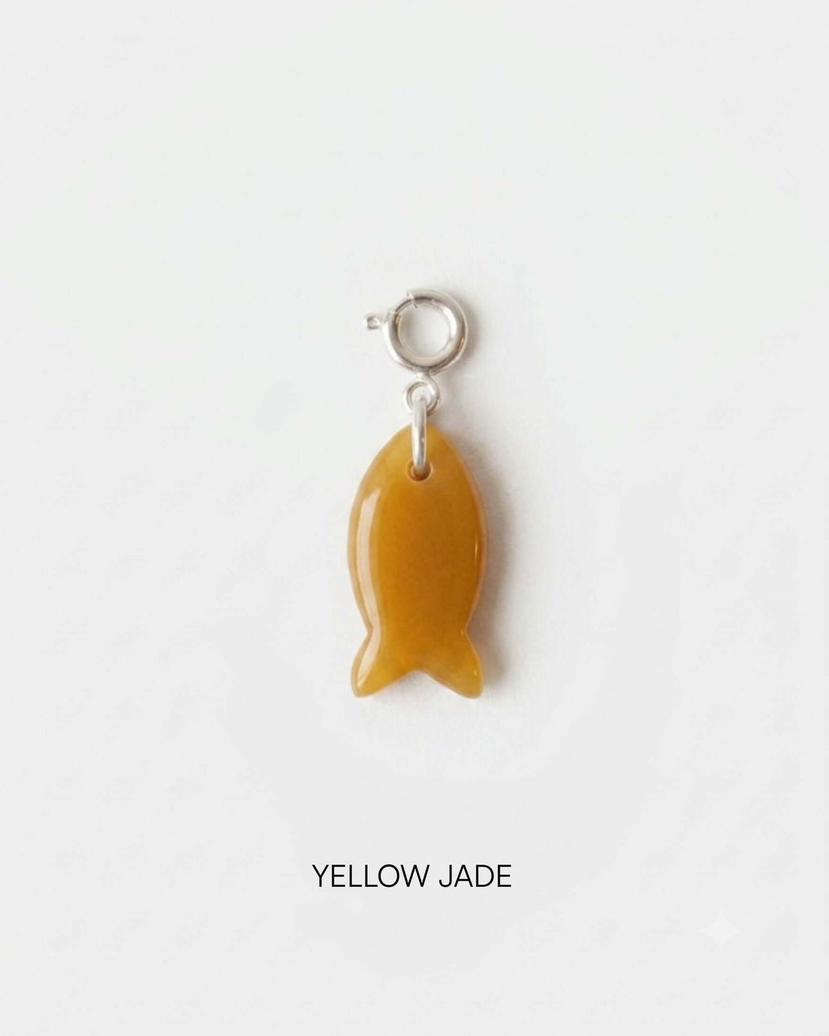 Fish Charm Small in Yellow Jade, elegantly shaped fish charm for versatile styling and natural aesthetics.